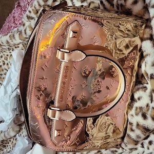 Rose gold Michael kors purse